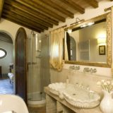 italy wedding venues. The Wedding Suite bathroom, detail of the Roman mosaic and the Carrara marble sink