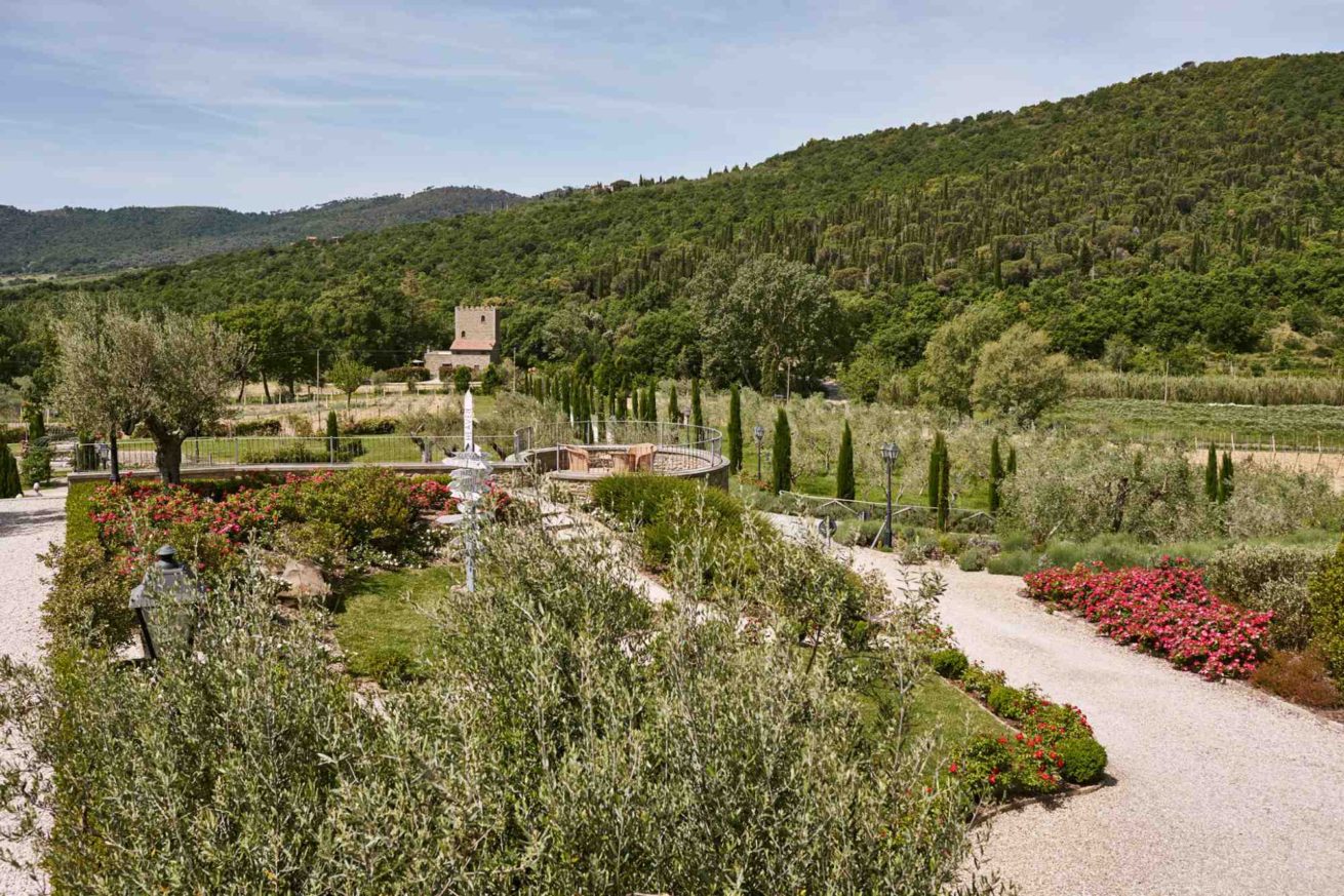 View of Exclusive weddings villa Italy Baroncino garden ancient tower.