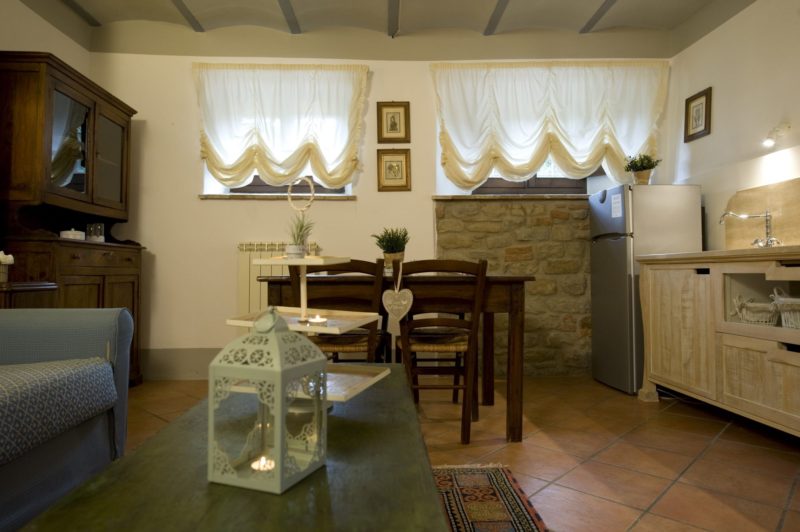 Weddings tuscany villa. A detail of the living and kitchen area in Suite Villa 6.
